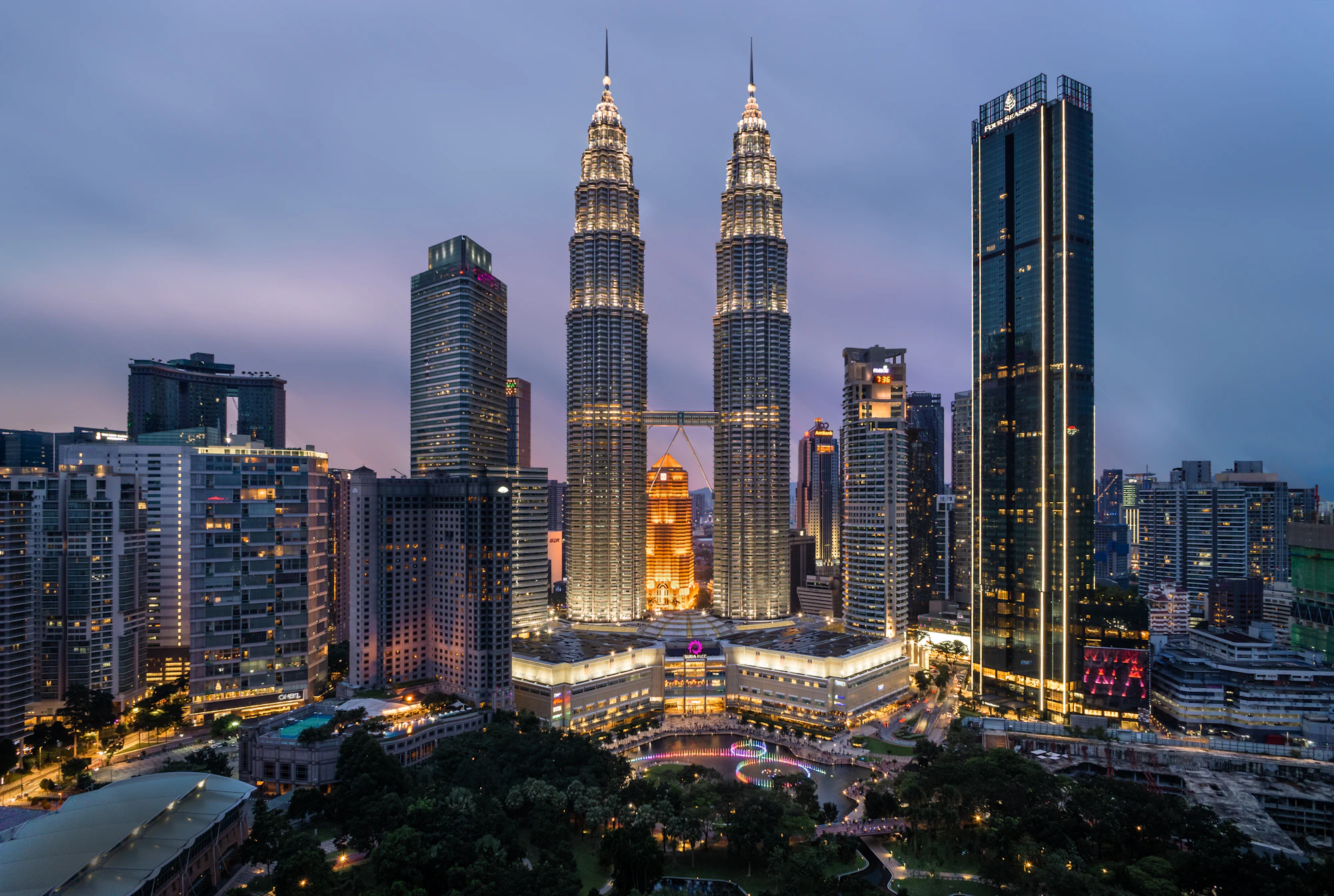 Kuala Lumpur skyline at dusk with the Petronas Towers